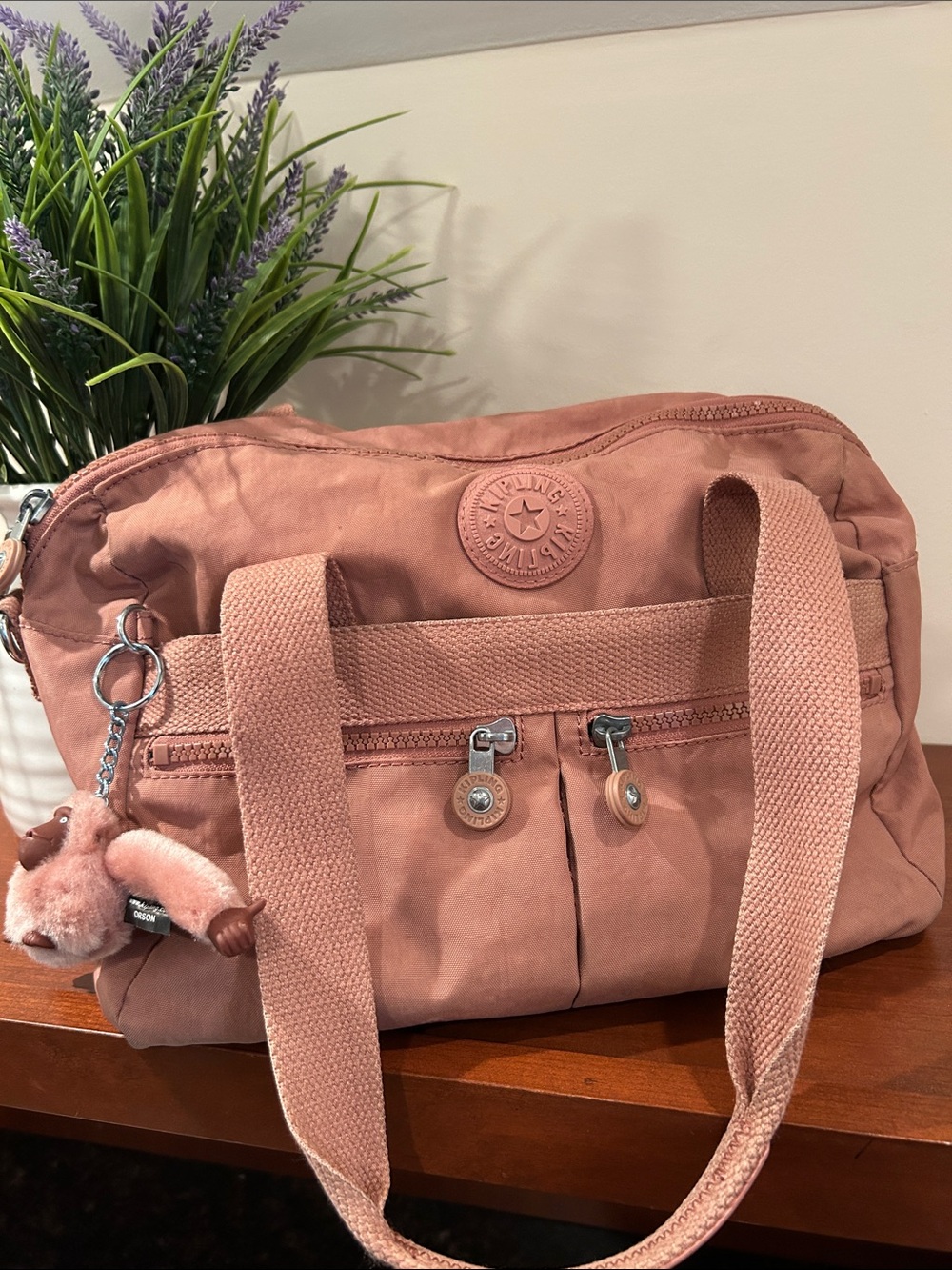 Kipling Klara crossbody handbag in soft kind rose with monkey Orson